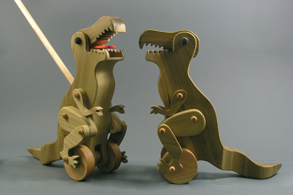 wooden articulated dinosaur push toy